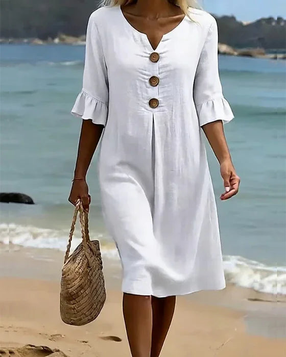 Vestido con textura de lino con manga abullonada y botones