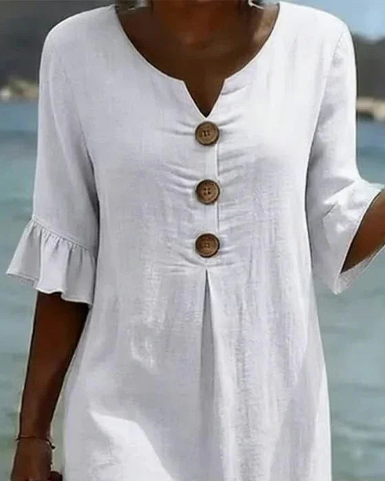 Vestido con textura de lino con manga abullonada y botones