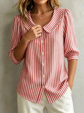 Blusa de algodón a rayas con botones